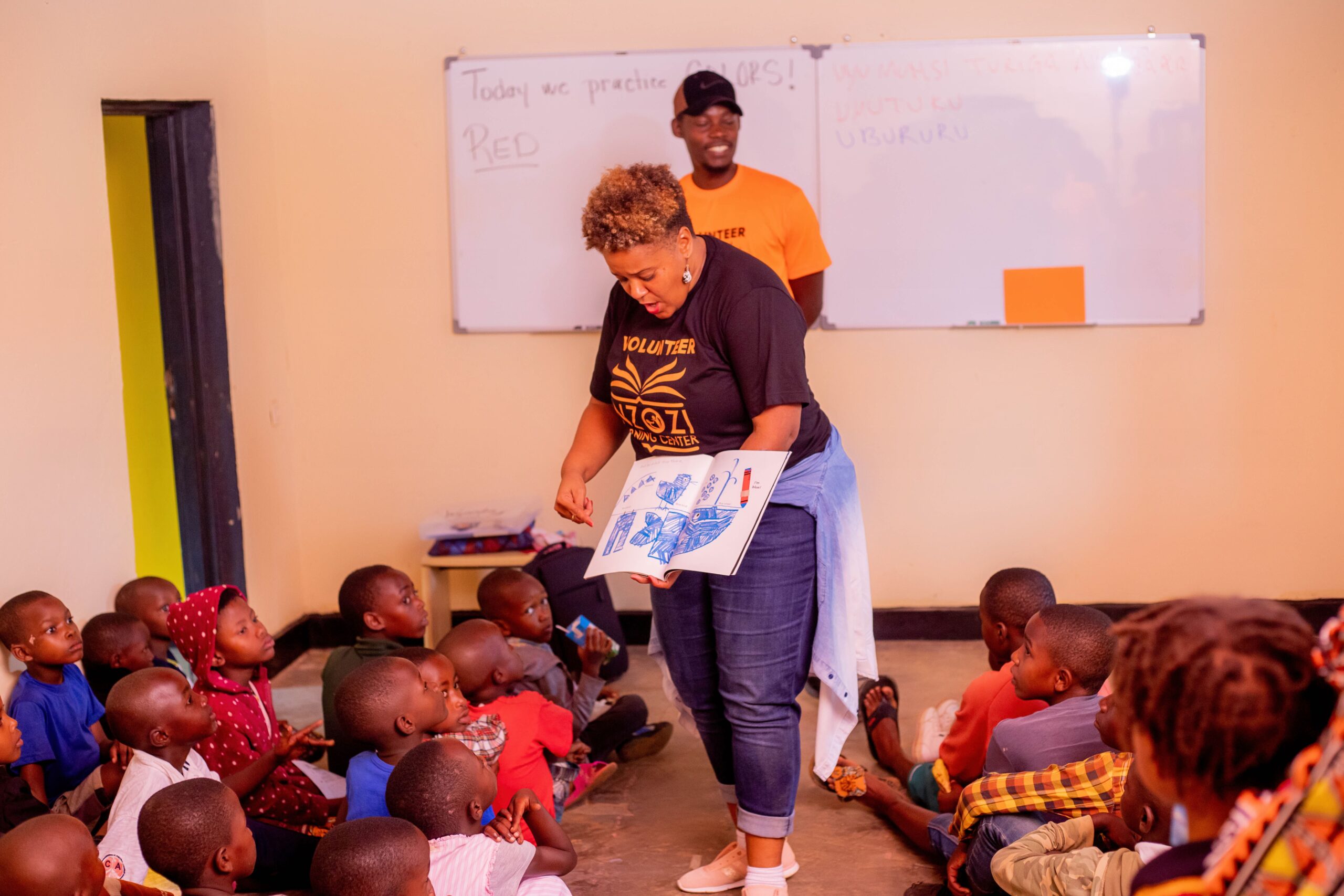 Children and volunteers at Inzozi Learning Center — moment 2