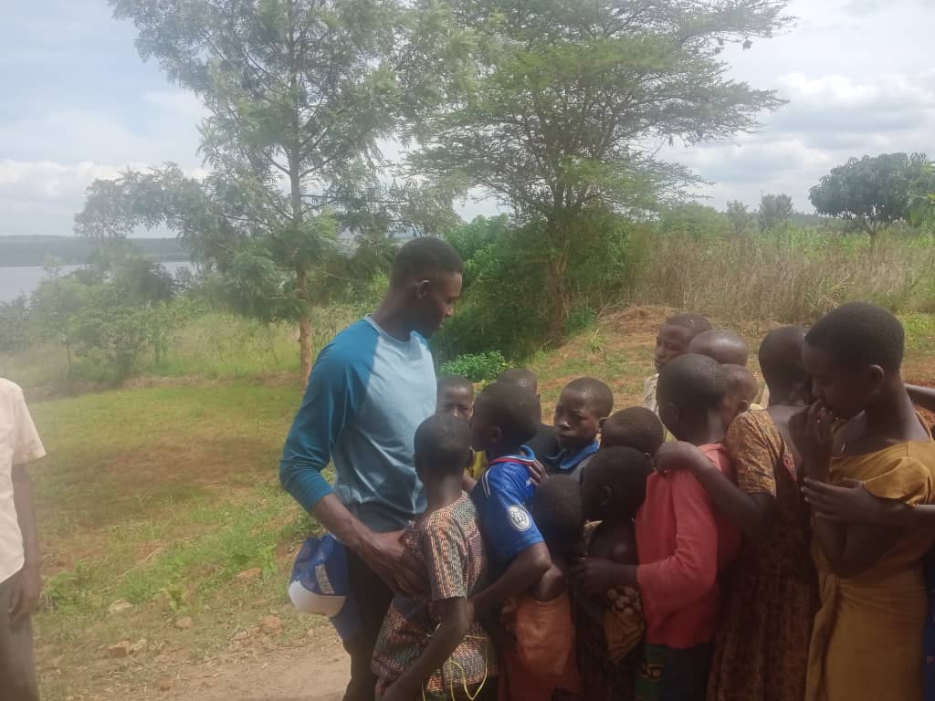 Children and volunteers at Inzozi Learning Center — moment 8